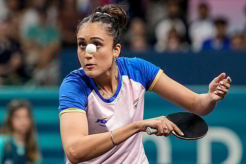Manika Batra plays a shot against France's Prithika Pavade